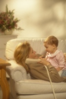 Baby watching Mom talk on the phone, learning to talk